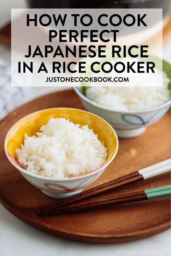 Japanese rice bowls containing perfectly cooked Japanese rice.